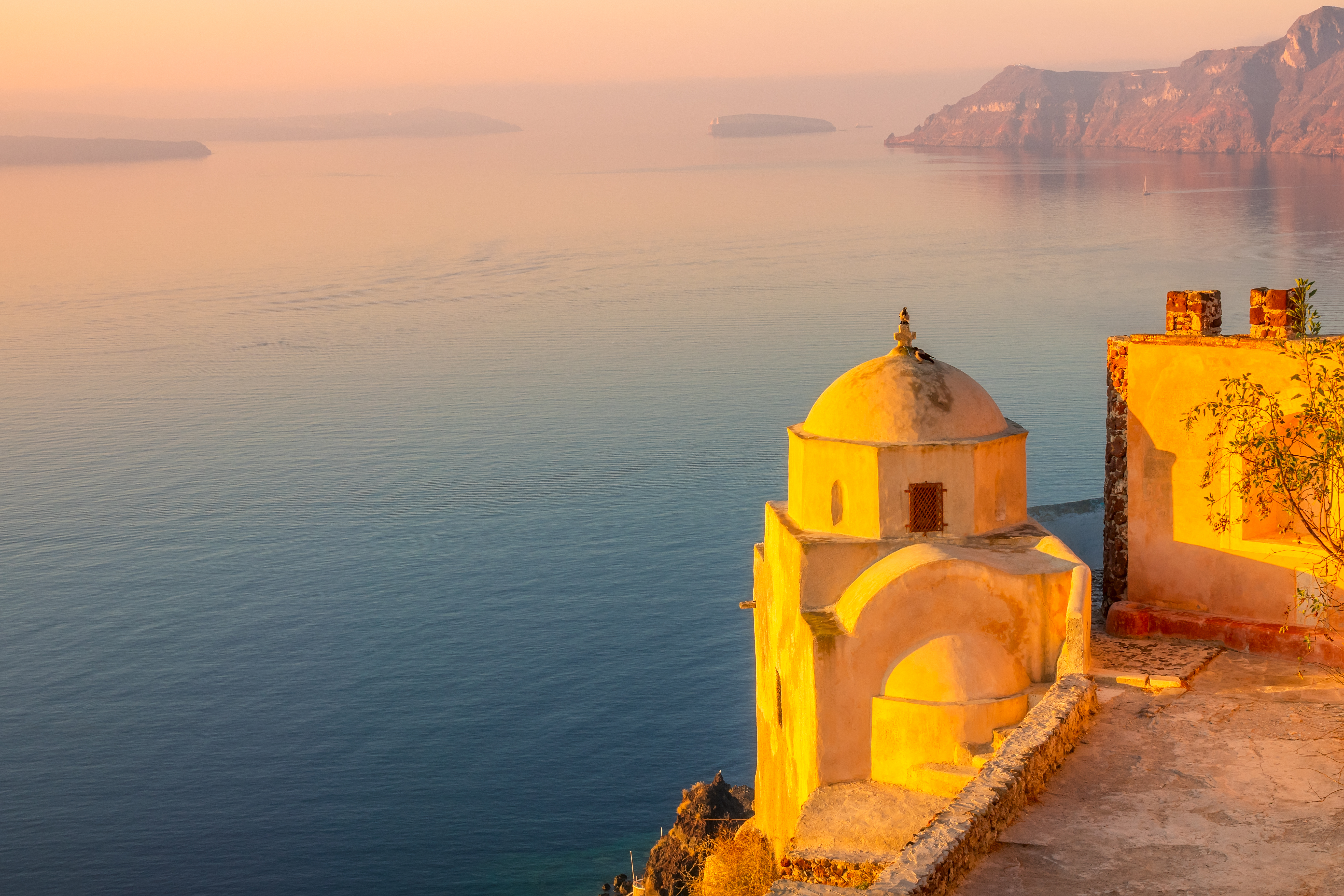 Greece.,Santorini,Island,At,Sunset.,Old,Greek,Church,In,Oia